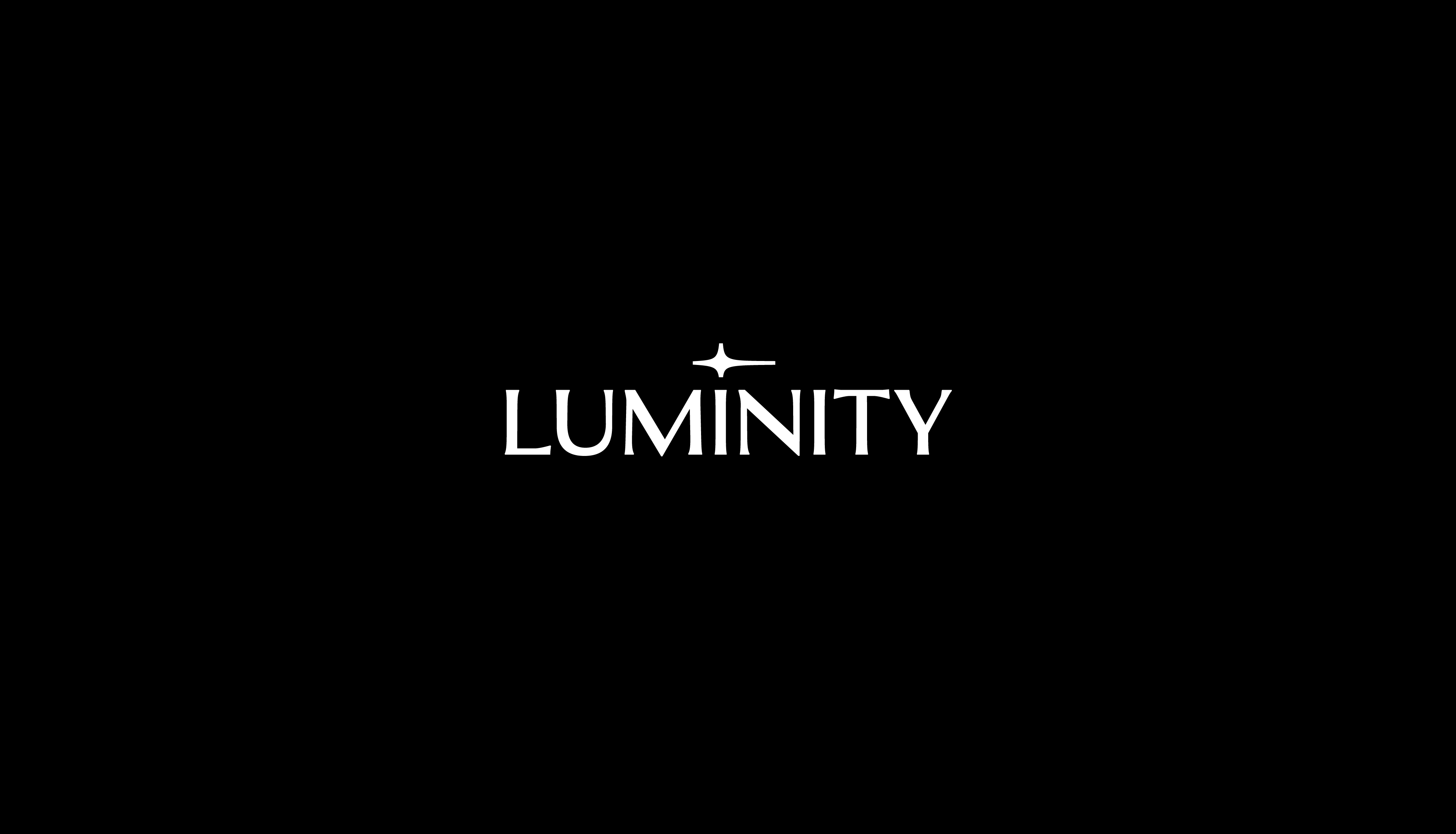 Luminity elegant white logotype with spark star favicon, custom letterforms in elegant wedge serif